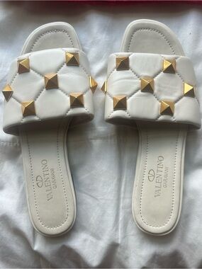 Valentino Garavani White Quilted Slide Sandals with Gold Pyramid Studs